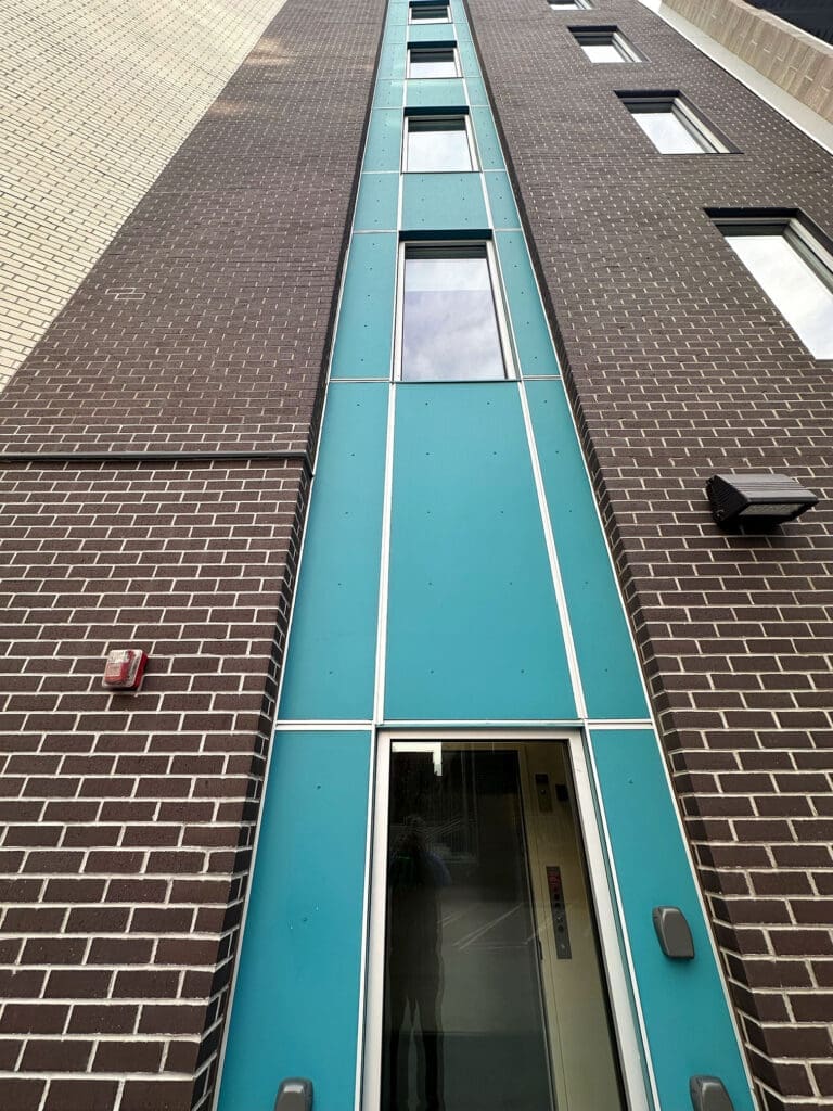 easy trim blue panelling on building