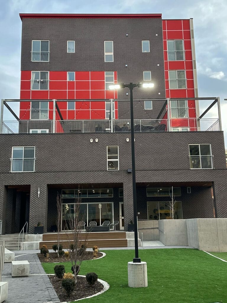 EasyTrim Salt Lake City Apartment grey brick with red panelling
